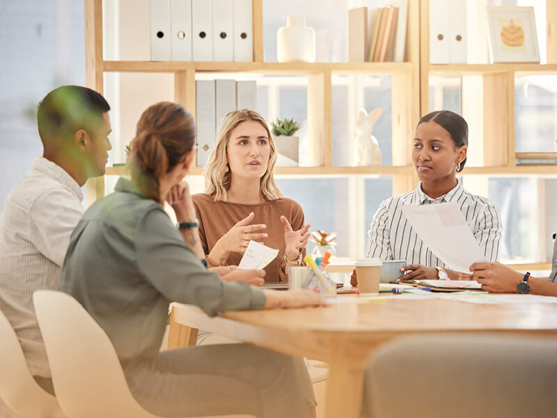 Staff discussing topic